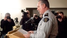 Sgt. Peter Thiessen reads a statement from a victim of a gang rape during a news conference in Maple Ridge, B.C. Thursday Jan. 6, 2011. (Jonathan Hayward / THE CANADIAN PRESS)