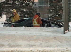 Emergency crews respond to a single-vehicle crash Wednesday morning on the Ring Road in Regina.
