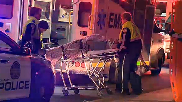 Paramedics assist injured man