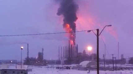Thick black smoke and flames can be seen in this still image taken from video of the explosion and fire at the Horizon Oilsands facility in Fort McMurray on Thursday January 6, 2011. 