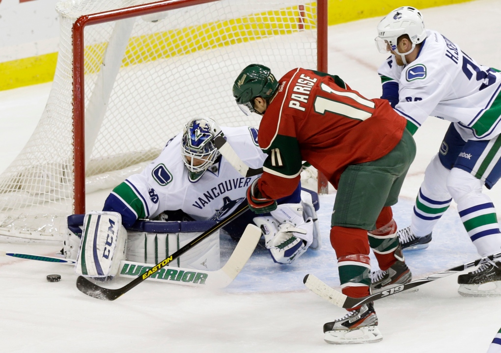 Canucks and Wild in action on Feb. 7, 2013.