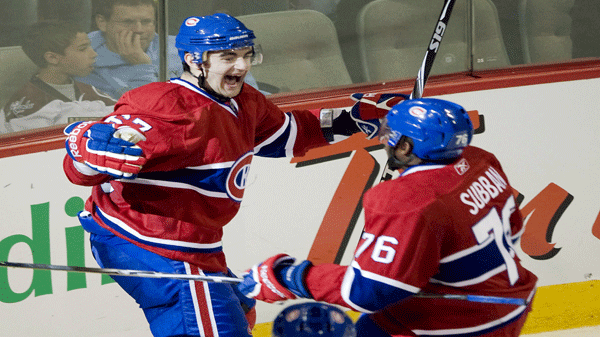 Montreal Canadiens' Max Pacioretty, left, celebrates with teammate PK Subban after scoring the over-time winning goal to beat the Boston Bruins during NHL hockey game action in Montreal, Saturday, January 8, 2011.THE CANADIAN PRESS/Graham Hughes