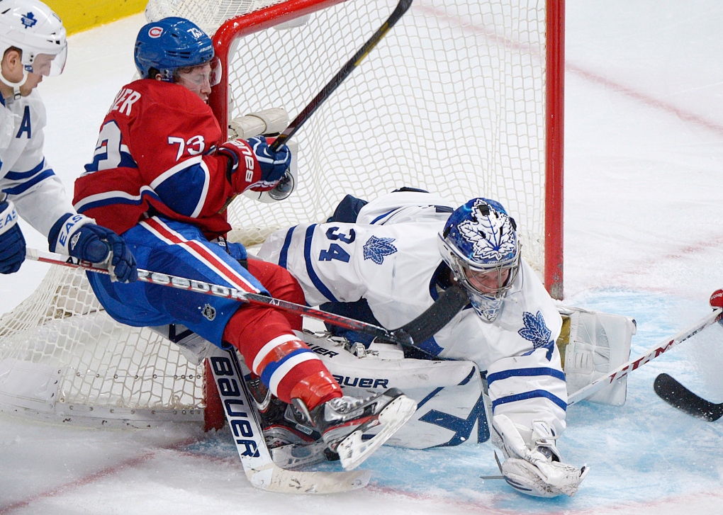 Maple Leafs' James Reimer makes a save 