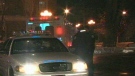 Police are shown at the scene of a shooting near an Exhibition Place nightclub early Sunday morning. 