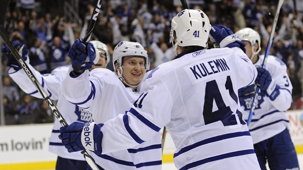 Toronto Maple Leafs center Mikhail Grabovski, left, of Germany, celebrates teammate Toronto Maple Leafs right wing Nikolai Kulemin's (41), of Russia, goal during the third period of an NHL hockey game against the Los Angeles Kings, Monday, Jan. 10, 2011, in Los Angeles. The Maple Leafs won 3-2. (AP Photo/Gus Ruelas)