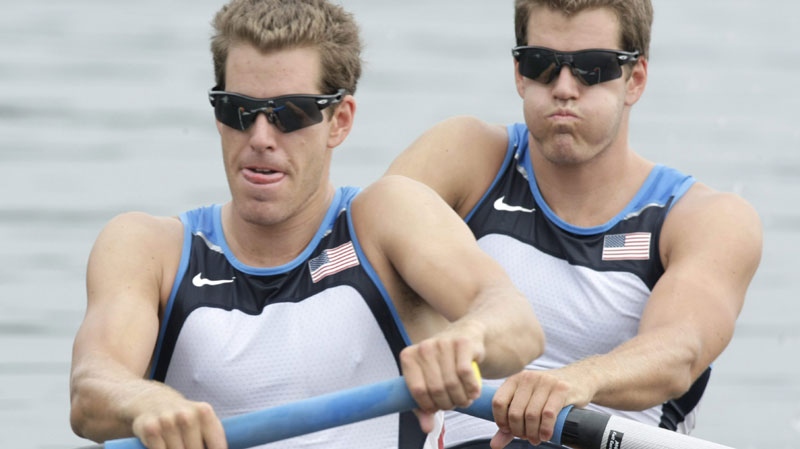 USA's Cameron Winklevoss, left, and twin brother Tyler take the start of their Men's pair repechage at the Beijing 2008 Olympics in Beijing, Monday, Aug. 11, 2008. (AP Photo/Gregory Bull)