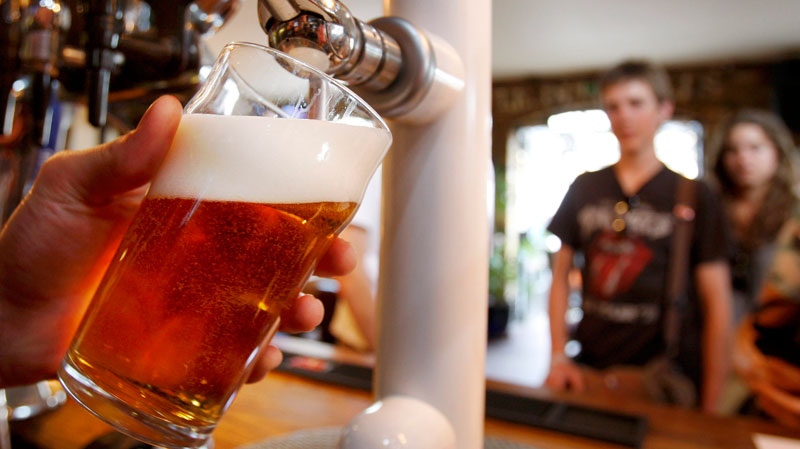 A pint of beer is pulled in a pub in London, Monday, July 28, 2008. (AP / Kirsty Wigglesworth)
