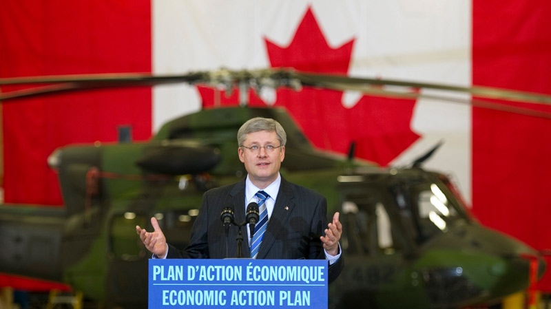 Prime Minister Stephen Harper speaks to employees during a visit to  the Bell Textron plant  Friday, January 14, 2011  in Mirabel, Quebec. (Ryan Remiorz / THE CANADIAN PRESS)