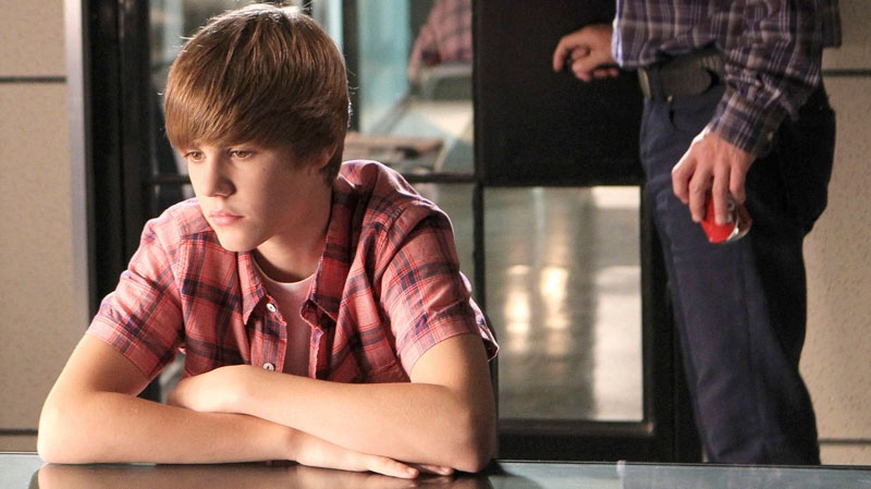 Singer Justin Bieber portrays Jason McCann, left in a scene from Bieber's acting debut in 'CSI: Crime Scene Investigation.' (CBS, Sonja Flemming)