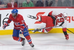 Montreal Canadiens' P.K. Subban, left, avoids a ch