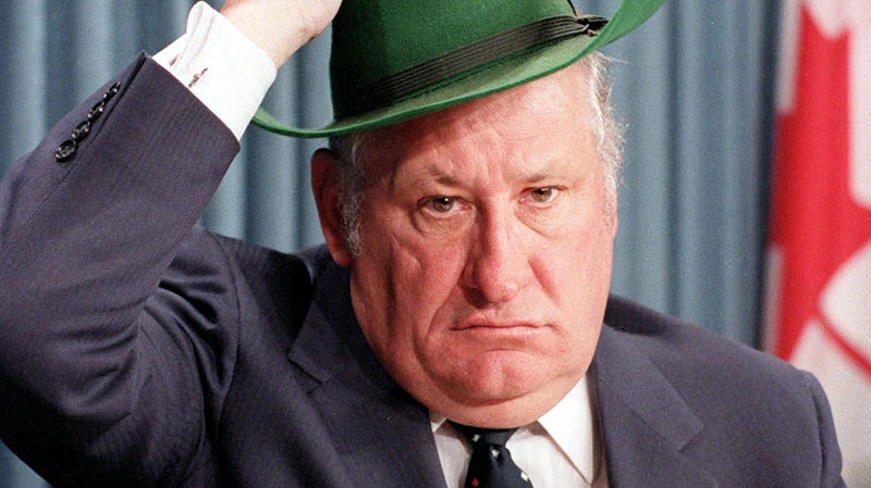 Eugene Whelan straightens his hat as he leaves a press conference in Ottawa Thursday after announcing he is running for leadership of the Liberal party in this 1984 file photo. (Peter Bregg / THE CANADIAN PRESS)