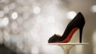 A stiletto-heeled shoe by Christian Louboutin is displayed at Saks Fifth Avenue in New York in 2007. (AP / Mark Lennihan)