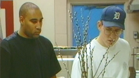 Rory Foreman, left, is seen in this image taken from video captured the same day Joan Heimbecker was killed, March 30, 1994.