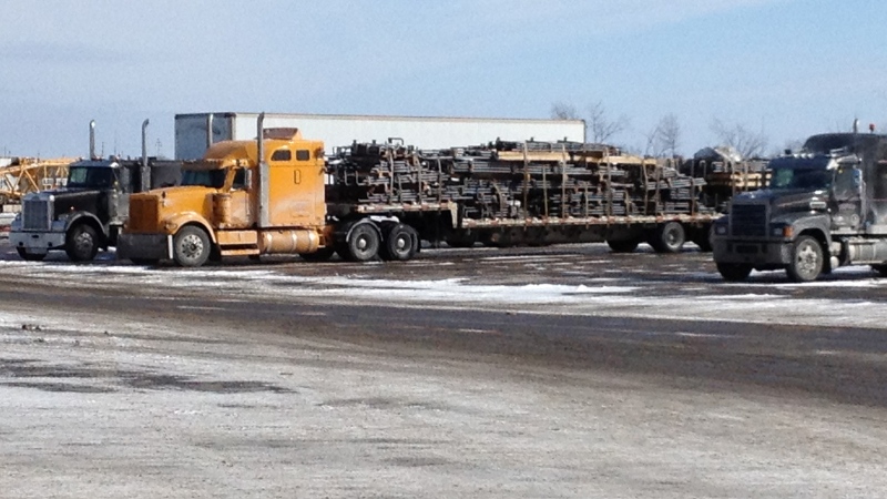 Transport trucks coming off trips up to six-weeks long taking a break at the Antrim truck stop.