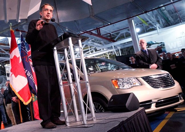 Chrysler Group CEO Sergio Marchionne speaks to workers and media at a press conference at an event to celebrate production of new 2011 minivans at the Chrysler minivan plant in Windsor, Ont., Jan. 18, 2011. (Geoff Robins / THE CANADIAN PRESS)  