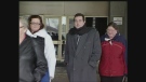 Christopher Gale, center, is seen outside the courthouse in London, Ont. on Friday, Feb. 22, 2013.