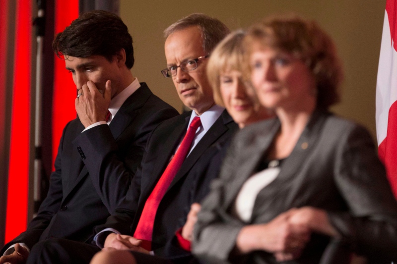 Justin Trudeau, left, sits with fellow candidates, left to right, George Takach, Joyce Murray and Karen McCrimmon during the Liberal leadership debate in Mississauga, Ont., on Feb. 16, 2103. (Chris Young/THE CANADIAN PRESS)