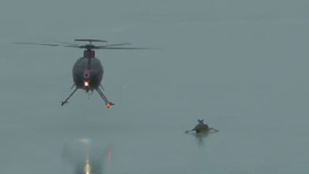 Ian Waugh captured a video of a Department of Natural Resources helicopter rescuing a deer trapped on thin ice.