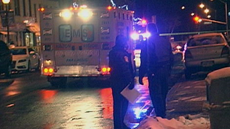 Officers are shown at the scene of a deadly altercation in Oakville, Ont. on Saturday, Jan. 22, 2011.