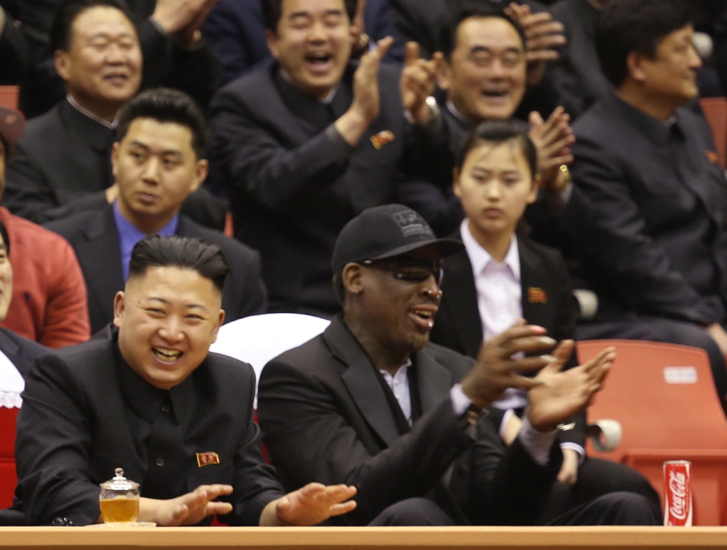 Dennis Rodman watches basketball with Kim Jong Un
