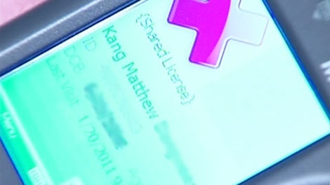 The information displayed by an ID scanner, including name and date of birth, is seen in this image taken from video.