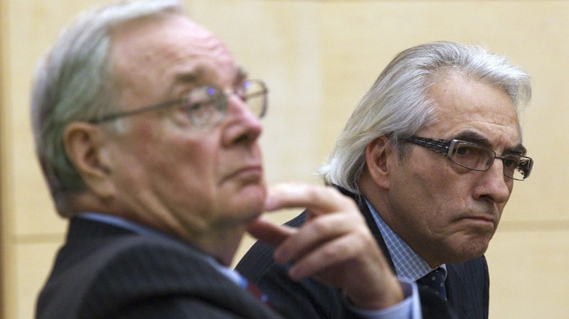 Chief Phil Fontaine (right) and Former Prime Minister Paul Martin listen to a question during a discussion on Indigenous governance in a new century at Ryerson University in Toronto on Tuesday January 25, 2011. (THE CANADIAN PRESS/Frank Gunn)