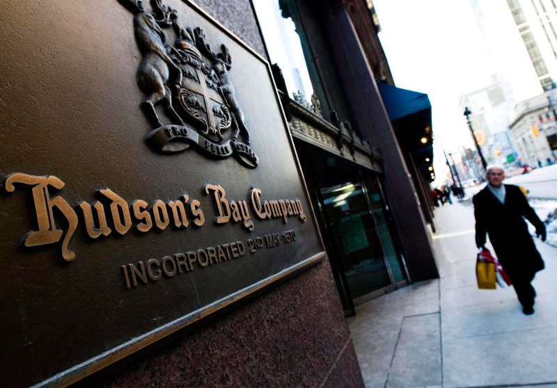 A man walks past the Hudson's Bay Company sign in downtown Toronto on Wednesday, Feb. 4, 2009. (Nathan Denette / THE CANADIAN PRESS)