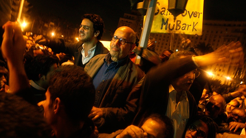Egyptian Nobel Peace laureate and democracy advocate Mohamed ElBaradei arrives to address the crowd at Tahrir Square in Cairo, Egypt, Sunday Jan.30, 2011. (AP / Khalil Hamra)