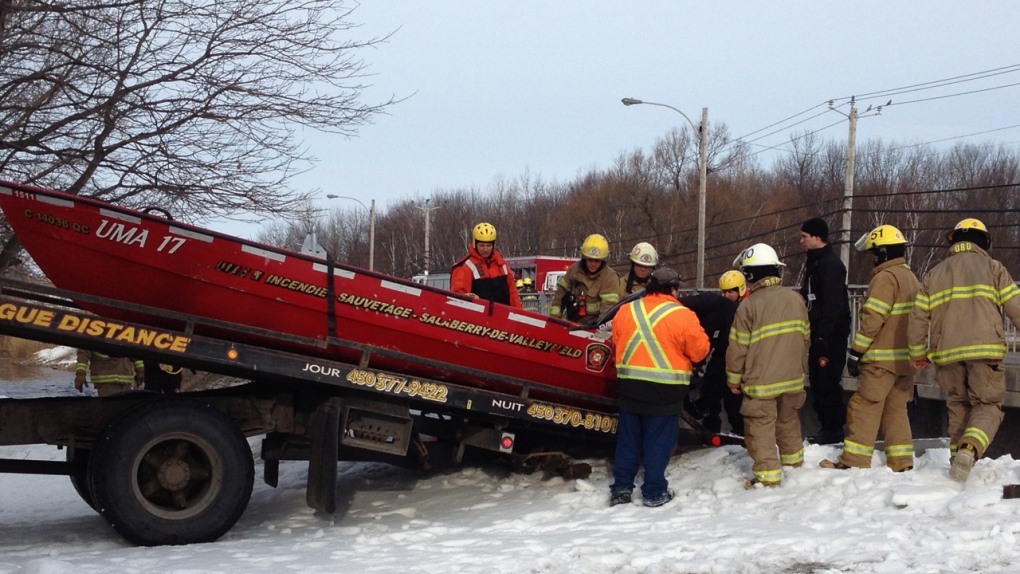 Firefighters with boat