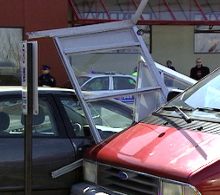 The aftermath of a fatal collision in a  plaza parking lot near Carling Avenue and Richmond Road in Ottawa, Wednesday, April 2, 2008.