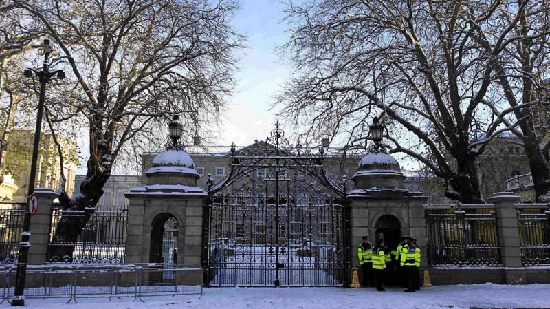 Snow covers the ground outside Leinster House, the building housing the national parliament, in Dublin, Ireland, Sunday, Nov. 28, 2010. (AP Photo/Peter Morrison) 