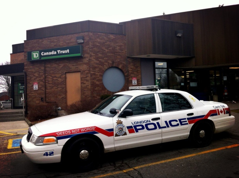 London police investigate after a bank robbery in London, Ont. on Tuesday, March 12, 2013. (Talia Ricci / CTV London)