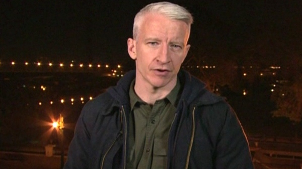 CNN's Anderson Cooper is seen reporting from Cairo, Egypt.
