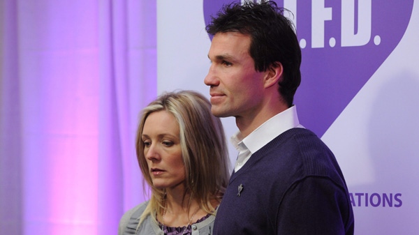 Ottawa Senators assistant coach Luke Richardson and his wife Stephanie arrive for an announcement on mental health in Ottawa, Wednesday, Feb. 2, 2011. The Richardson's daughter Daron committed suicide last year. THE CANADIAN PRESS/Adrian Wyld