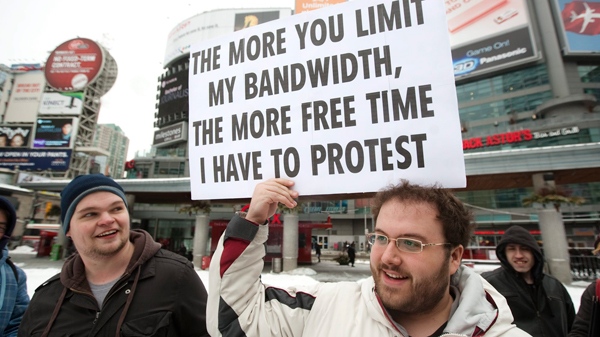 Demonstrators gather for a 'Stop The Internet Meter' rally to protest usage-based internet billing in downtown Toronto Friday, Feb. 4, 2011. (Darren Calabrese / THE CANADIAN PRESS)     