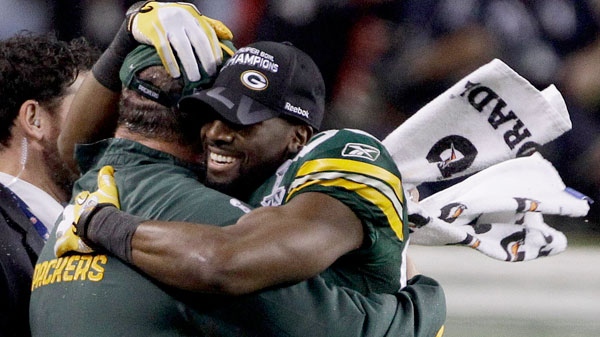 Green Bay Packers head coach Mike McCarthy is embraced by Green Bay Packers' Greg Jennings after the NFL Super Bowl XLV football game against the Pittsburgh Steelers, Sunday, Feb. 6, 2011, in Arlington, Texas. (AP / Kathy Willens)