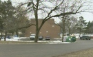 Police were seen outside this apartment building on Courtland Avenue in Kitchener, Ont., on Monday, March 18, 2013. (CTV Kitchener)