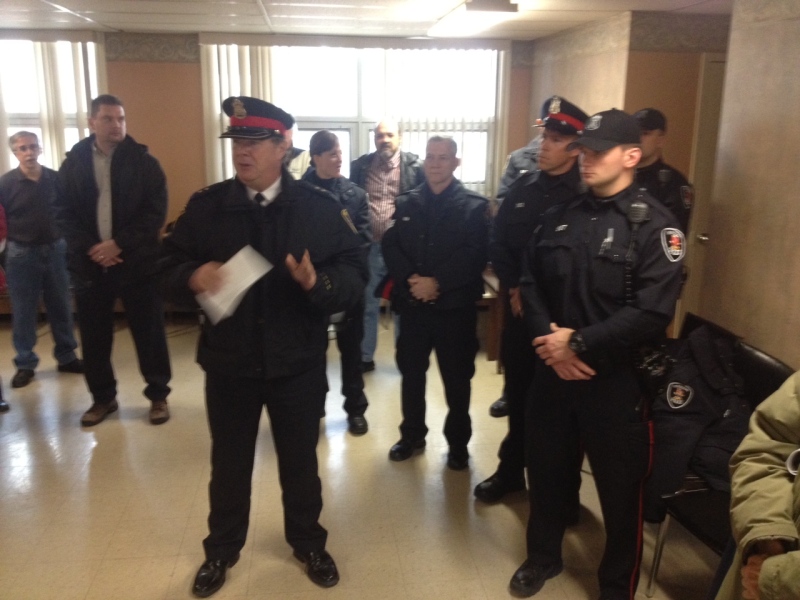 Windsor police officers attend the launch of the Ouellette Manor Neighbourhood Watch Program in Windsor, Ont., on Tuesday, March 19, 2013. (Chris Campbell / CTV Windsor)