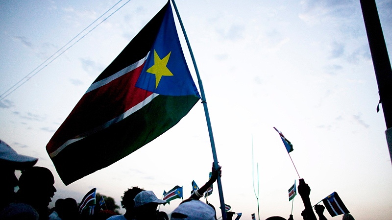 Southern Sudanese celebrate the formal announcement of referendum results in the southern capital of Juba, Monday, Feb. 7 2011. (AP / Pete Muller)