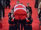 Pallbearers carry the casket of Const. Jennifer Kovach at her funeral in Guelph, Ont., on Thursday, March 21, 2013. (Nathan Denette / THE CANADIAN PRESS)