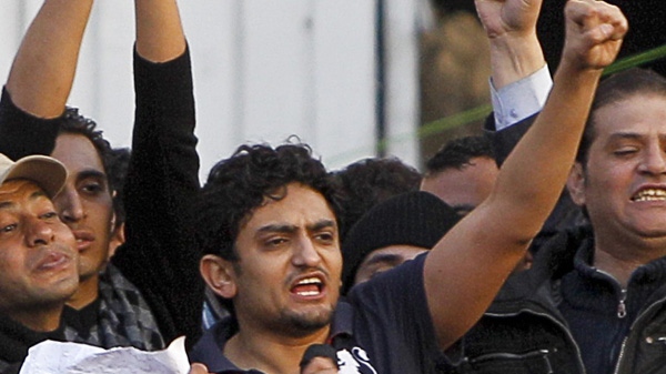 Egyptian Wael Ghonim, centre, addresses the crowd in Cairo's Tahrir Square on Tuesday, Feb. 8, 2011. (AP Photo/Tara Todras-Whitehill)