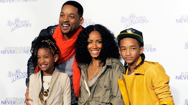 Will Smith, top left, and his wife Jada Pinkett Smith pose with their daughter Willow, left, and son Jaden at the premiere of the documentary film 'Justin Bieber: Never Say Never,' in Los Angeles, Tuesday, Feb. 8, 2011. Jaden Smith is featured in the film. (AP / Chris Pizzello)