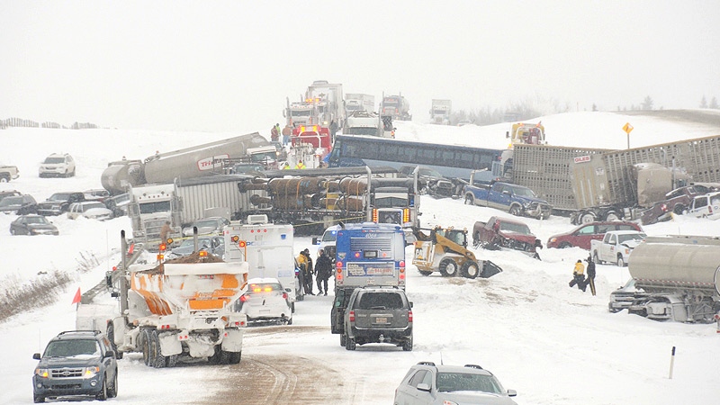 RCMP released this photo showing part of the scene of the crash on the QE2 Highway at Hwy 13 on Thursday, March 21. Supplied.