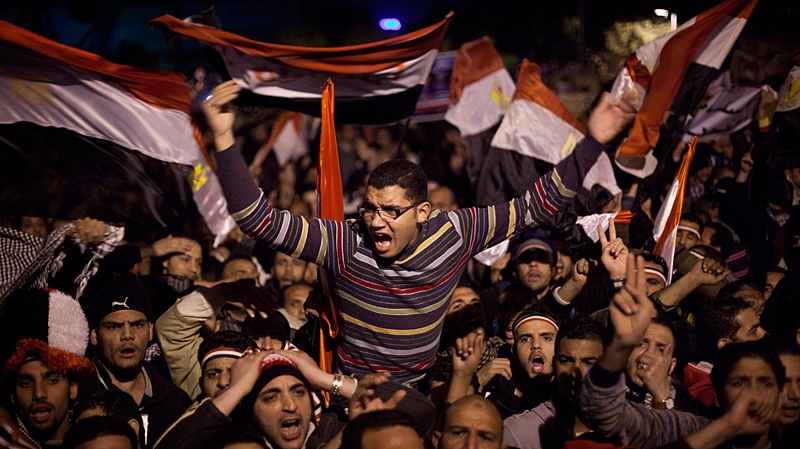 Anti-government protesters react as Egyptian President Hosni Mubarak makes a televised statement to his nation in Tahrir Square in downtown Cairo, Egypt Thursday, Feb. 10, 2011. (AP / Emilio Morenatti)