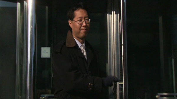 Dr. Justin Onzuka, from Mississauga, is seen leaving an Ontario court on Thursday, Feb. 10, 2011.