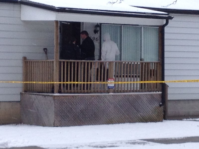 The Windsor police forensic unit investigates after a fatal stabbing on Aubin Road in Windsor, Ont., on Monday, March 25, 2013. (Chris Campbell / CTV Windsor) 