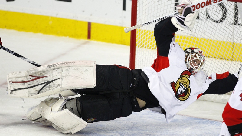 Ottawa Senators goalie Robin Lehner, from Sweden, dives across the net to make a save during second period NHL hockey action against the Calgary Flames in Calgary, Alta., Wednesday, Feb. 9, 2011.THE CANADIAN PRESS/Jeff McIntosh