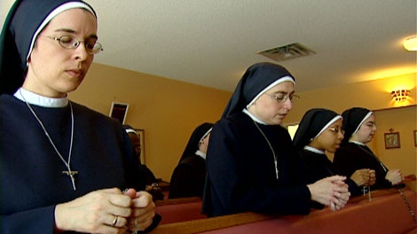 Sister Michael Daniel, a Roman Catholic nun, prays in Cambridge, Ont. on Thursday, Feb. 10, 2011.