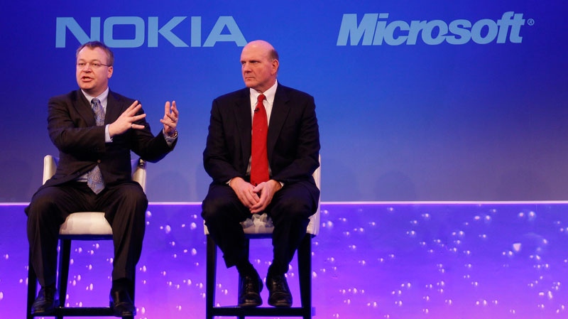 Stephen Elop CEO of Nokia, left, with CEO of Microsoft Steve Ballmer, speaking in London, as he announces the strategic partnership with Microsoft, Friday, Feb. 11, 2011. (AP / Alastair Grant)