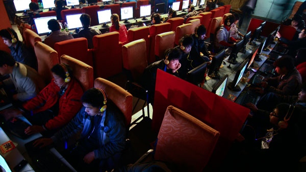 People use computers at an Internet cafe in Fuyang, in central China's Anhui province, Friday, March 12, 2010. (AP Photo)